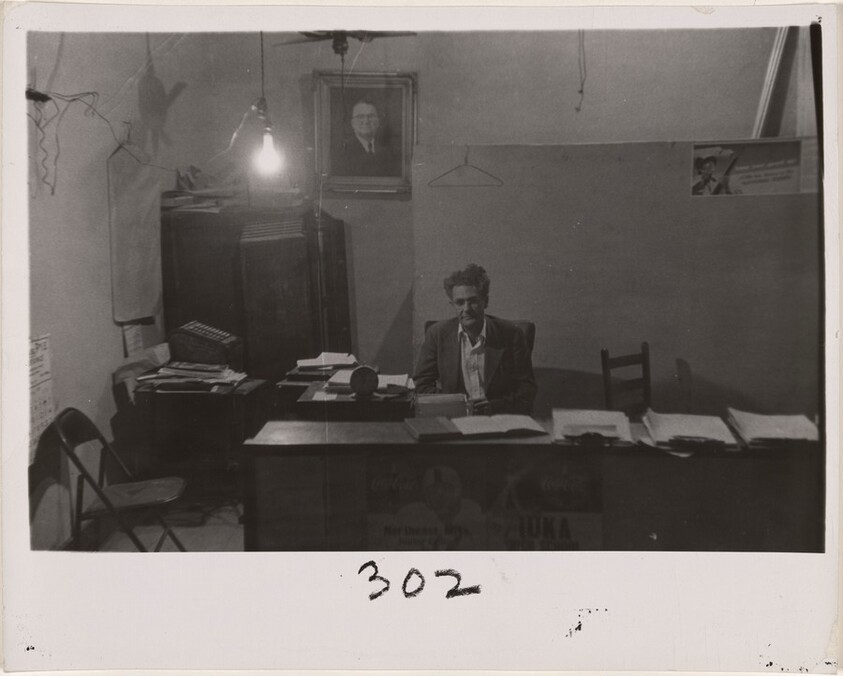 Man seated at desk--North Carolina