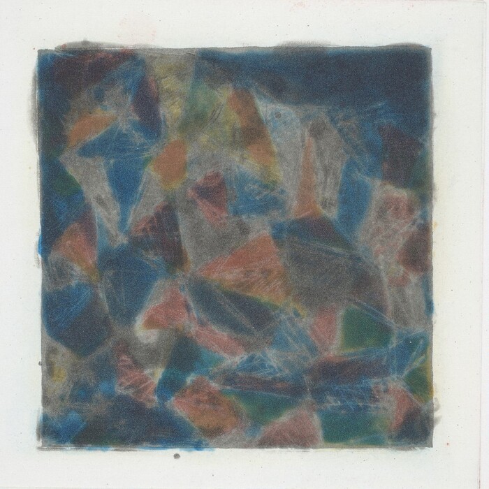 The image displays irregular geometric shapes interlocking and overlapping in a square frame. The composition combines blue, orange, and green hues with a textured smoky overlay blurring the boundaries between the shapes.