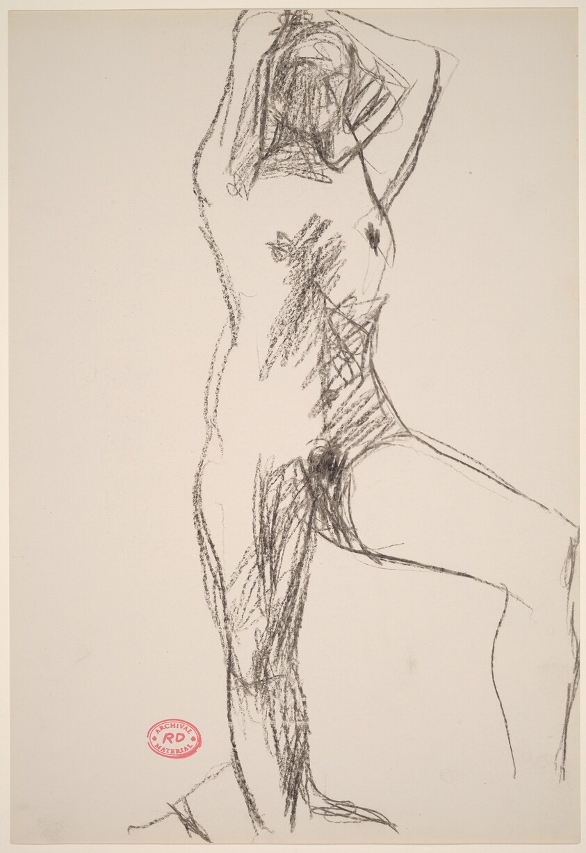Untitled [standing female nude with hands behind head]