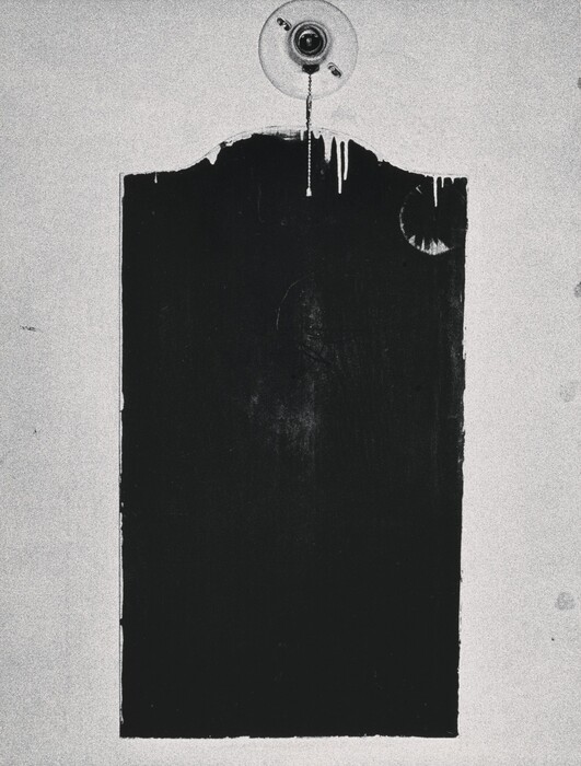 The image shows a large black rectangle with slightly irregular edges on a textured gray background. The rectangle's top edge is dripping downward. Above the rectangle is a circular shape resembling a ceiling fixture or light with a hanging chain. This creates a contrast between the solid black form and the textured background. The image is open to interpretation through its use of shape and line.