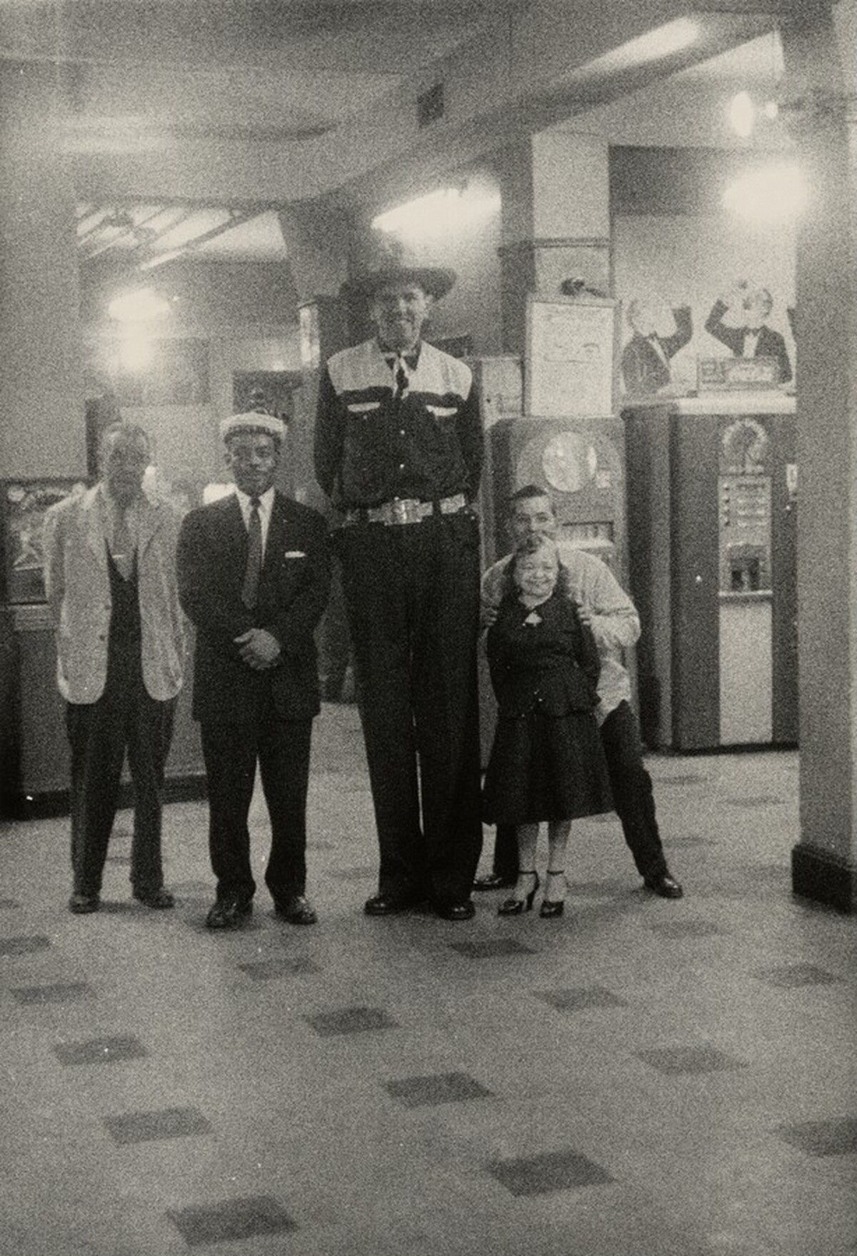 Charlie Lucas with giant Buck Nolan, lady midget Margharita and others, Hubert's Museum, N.Y.C. 1959