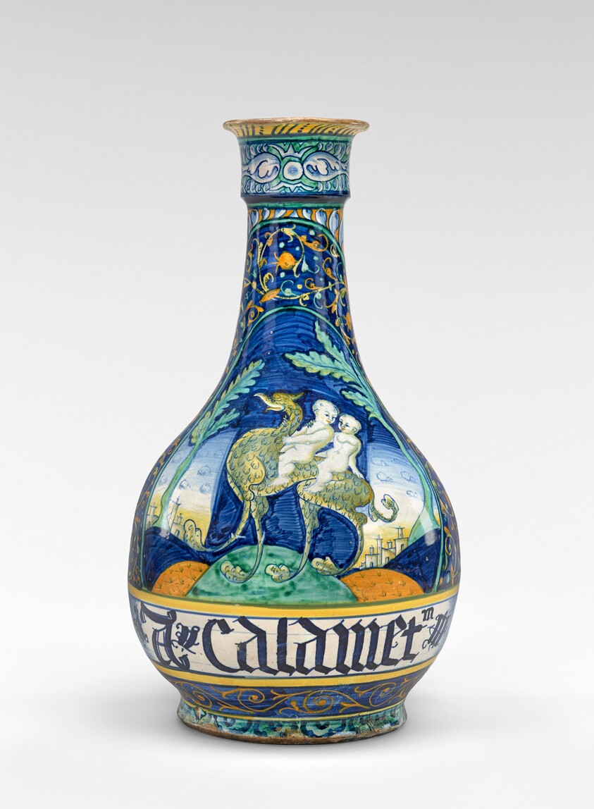 Tall drug bottle with two babies riding a griffin