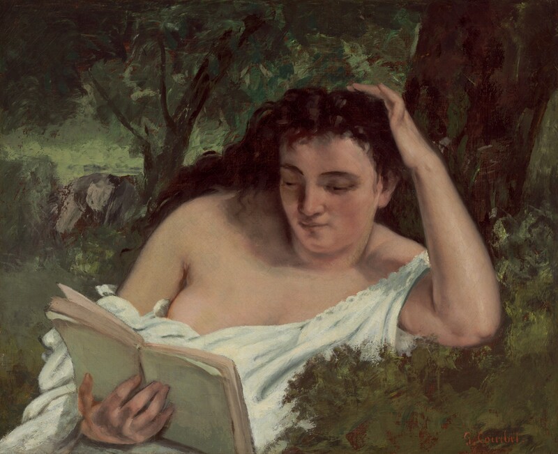 Shown from the waist up, a woman with pale, peachy skin reads a book with one elbow propped on a grassy bank in this horizontal painting. The woman’s body is angled to our right, and she looks down at a pale green-covered book held in her right hand, which is in the lower left corner of the composition. The woman has dark brows over hooded eyes, and her dark brown hair falls loosely behind her shoulders. She has a round face, straight nose, and pale lips. She touches her hair with her left hand, to our right, with that pinky delicately crooked. One strap of a sleeveless, pearl-white chemise falls off the shoulder of that arm, and the dress nestles around her belly, revealing much of the other breast. Leafy trees and gray rocks are loosely painted behind her. The artist signed the painting in the lower right corner, “G. Courbet.”