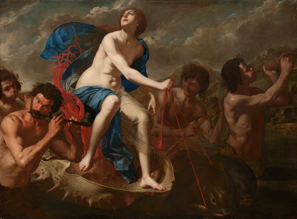A nearly nude, pale-skinned woman rides an oversized seashell being pulled by stylized dolphins in this horizontal painting. Four muscular, tanned men with dark, unruly curly hair surround the shell and play music. The woman sits on a seat made by twisting red coral with her body angled to our right. She turns her face up and to our left, to the sky. She has dark eyes and brows, a heart-shaped face, a cleft in her chin, and her pink lips are parted. Her auburn-brown hair appears gathered at the base of her neck and long tresses lift in the breeze over her right shoulder, to our left. A teardrop-shaped pearl hangs from the ear we can see. A celestial-blue cloth and a translucent white veil wraps over one shoulder and flutters behind her. The cloth then drapes across her back and over her thighs, exposing her soft tummy and rounded hips. The fish-like dolphins pulling the shell have rounded heads and black, glassy eyes. Short fins run the length of their curved backs over dark, olive-green skin. The woman guides them using red, twisted cords looped through their mouths. A pair of musicians are to each side of the shell. To our left and in the lower corner, one man holds a flute to his lips. The outer corners of his eyebrows arch up under a lined forehead. A ring of broad leaves wraps around his waist. Another man behind him blows with cheeks puffed into a shell as he looks at us. In the pair to our right, on the far side of the shell, one man holds a stick, perhaps guiding the vessel, while another, at the front of the grouping, blows into a shell. The man at front wears rings of leaves around his head and waist. The scene is lit starkly from our left, illuminating the woman and casting the rest into shadow. The water around the group is dark, pine green. Rocky mountains dotted with trees and buildings rise in the distance. Ash-gray clouds create diagonal bands moving up and to our right against a muted blue sky.