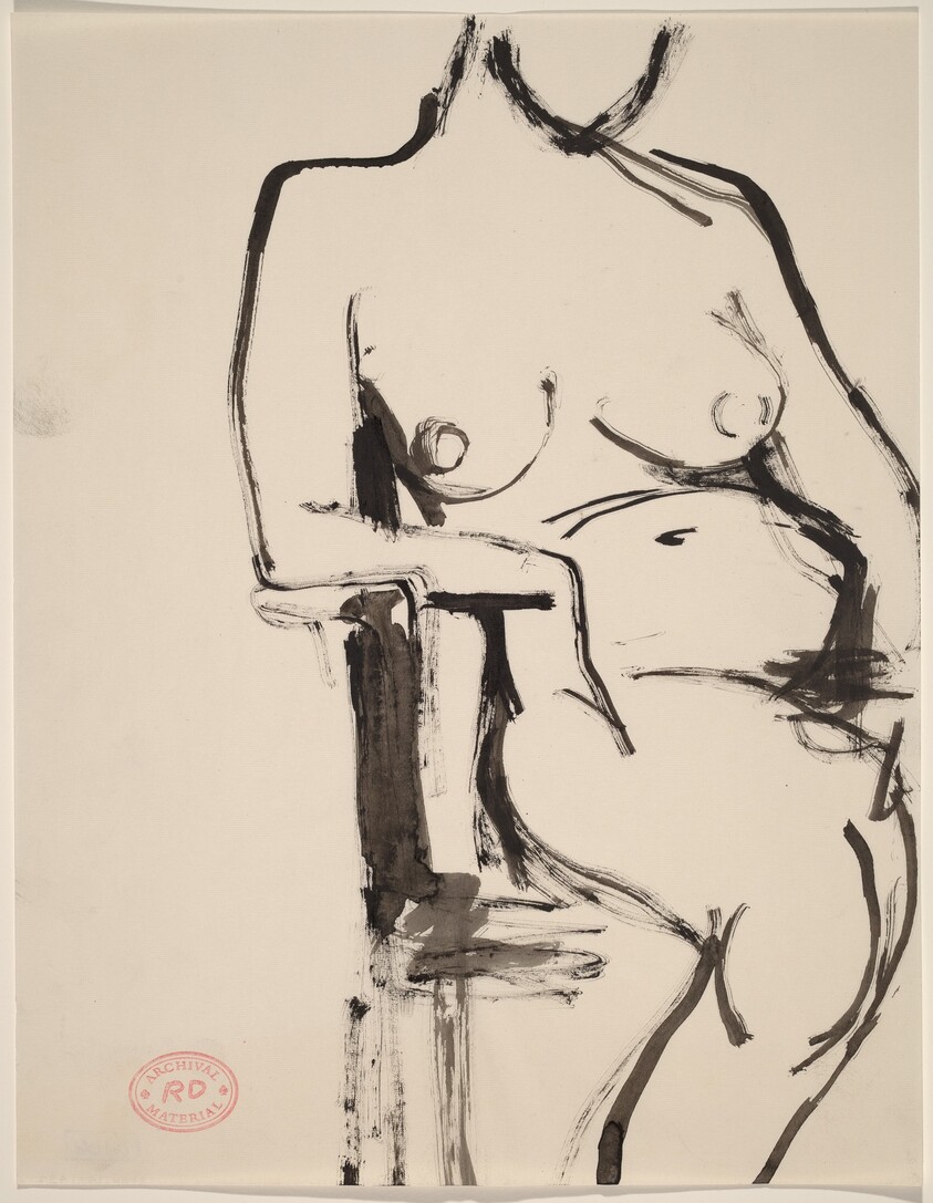 Untitled [female nude seated and leaning on chair arm]
