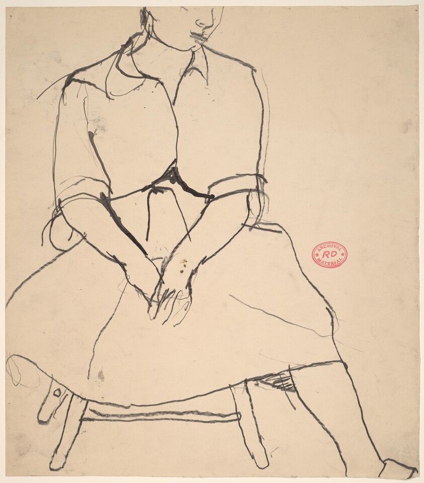 Untitled [woman in a shirt and skirt seated on a stool]