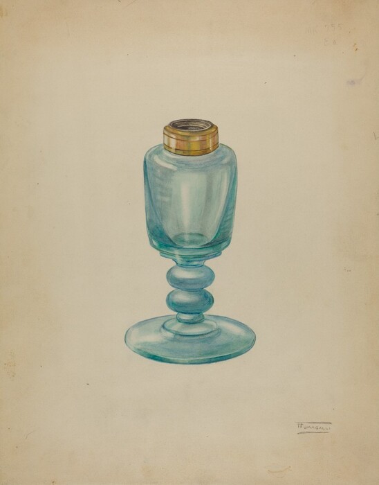 The image features a translucent glass object with a metal cap on top, placed on a pedestal base. The glass is a bluish-green hue, with varying intensity. It is set against a light beige background. There is a label at the lower right corner of the image.