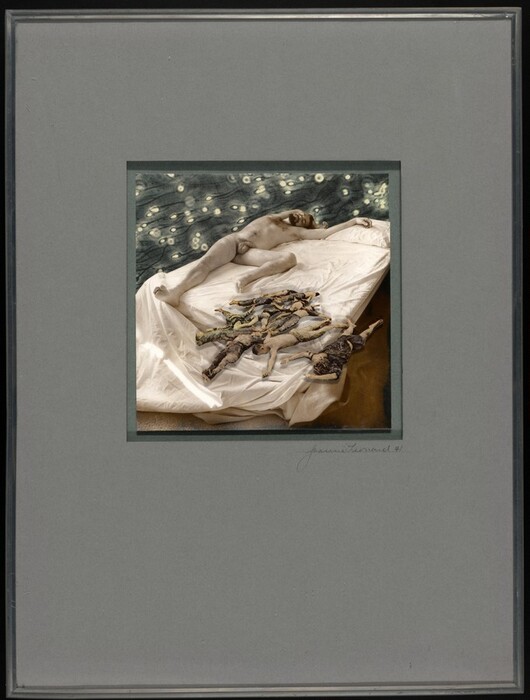 The image shows a person lying on a bed in a reclined position. They are turned slightly to one side, with one arm under their head and the other across their body. The person's face is partially hidden, and they have short hair. The person is unclothed and covered with a white sheet, with toy soldiers on it. The background has a circular or spiral pattern on a dark backdrop. The image is framed with a gray border.