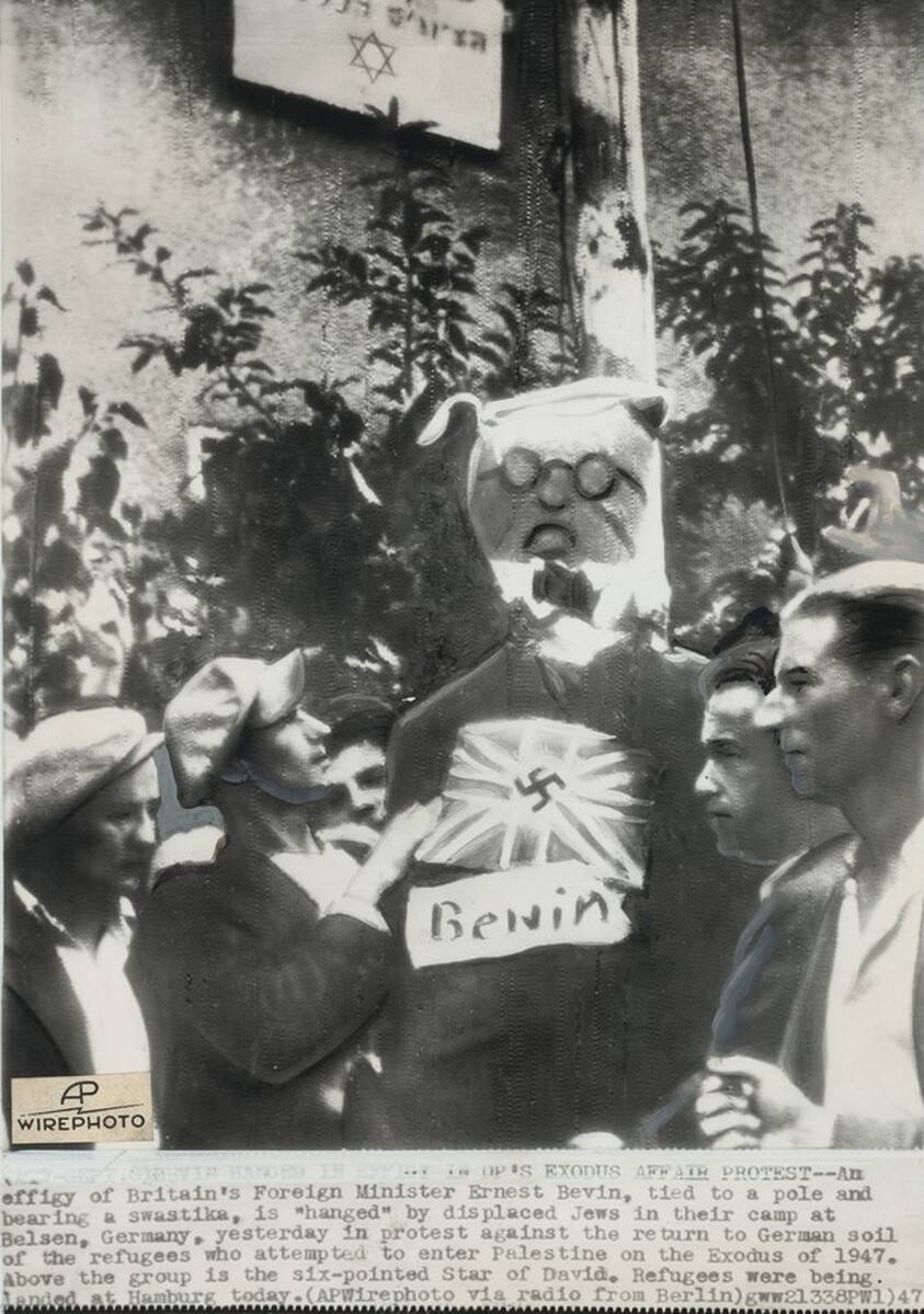 Title from caption on object: “Bevin Hangs in Effigy in DP's Exodus Affair Protest”