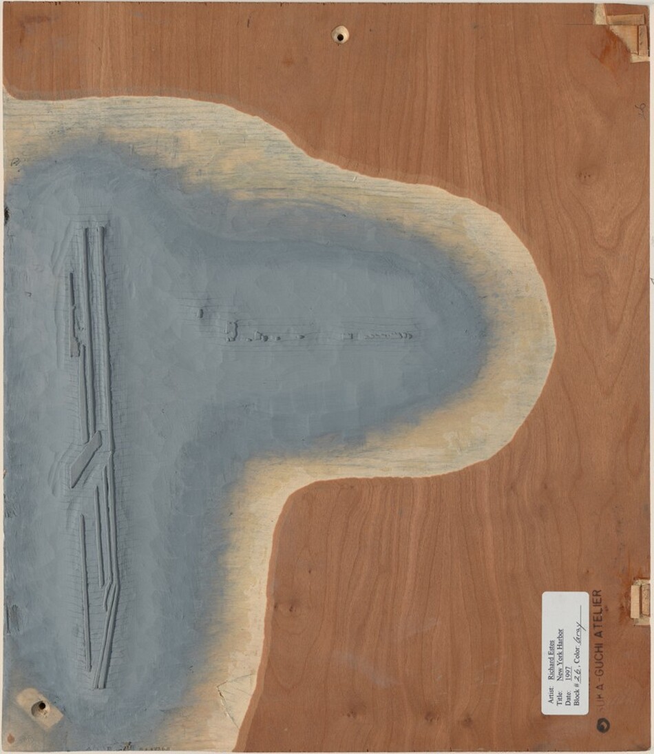 The image shows a large triangular shape made of textured gray material, surrounded by a wooden border with smooth, curvy lines. The gray area has layers of texture, while the wood creates a boundary around it.