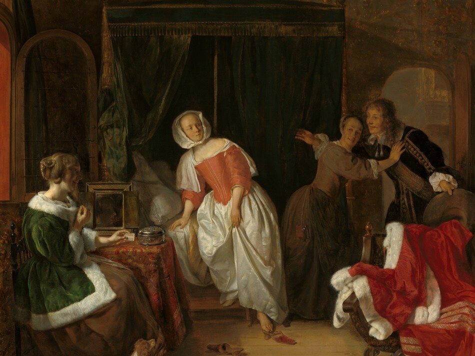 A young, smiling man bursts through the door of a dimly lit bedroom occupied by three women in this vertical painting. All four people have pale skin. The arched door is to our right and the man faces our left with his arms spread wide. He leans slightly forward as he holds the wide brim of his hat out by his left side, to our right. Shoulder-length chestnut-brown hair frames his face, and he wears a velvety brown jacket trimmed with tan stripes and pompoms down the front and along the sleeve we can see. A broad sash crosses his chest and tassels hang from his wide, white collar. Between us and him, a wooden chair is draped with a crimson-red cloak trimmed with white fur and bands of gold. A pewter pitcher and candlestick rest on the pine floor in front of it, near the lower right corner of the painting. The man is stopped at the door by a woman wearing a sable-brown gown with a tight-fitting bodice and a white cap on the back of her head. Her body faces the man as she leans toward him with her outstretched right hand resting on his shoulder, and she turns her smiling face back over her shoulder. Light from an open window on the left illuminates the woman in the center, who steps down from a bed enclosed by forest-green, velvet curtains trimmed with gold fringe and tassels. The curtains are parted behind her to reveal white pillows. She wears a long, gleaming white satin skirt topped by a tight-fitting coral-red bodice stitched with thin lines of gold. A white neckerchief covers her shoulders and is partially tucked into the bodice. Her head is covered by a white kerchief knotted under her chin. Her body faces us with one foot on a step stool, and the other foot reaches down to a gold and red shoe on the floor. Its mate lies nearby, pointing away from us. Her head is turned to our right to look at the man. She has a thin face with a high forehead, and small mouth is closed or pursed. Closest to us and near the lower left corner of the painting, the third woman sits alongside a small table under the open window. She wears a long, pine-green jacket trimmed with white fur over a brown skirt. Her auburn hair is partially coiled around her head, while some locks fall in bunched curls. She sits facing our right in profile with her back to the window, so her smiling face is mostly in shadow. Her left arm rests on the table, which is draped with a red and copper patterned cloth, and she holds a white comb in that hand. A mirror and round silver box sit on the table next to her. A small brown and white dog stands by her feet, its head tilted up to look at the others. The far wall of the room is covered with a faint pattern of golden brown vines and leaves against a forest-green background. The artist signed the painting on the face of the step leading up to the bed, “G. Metsu.”