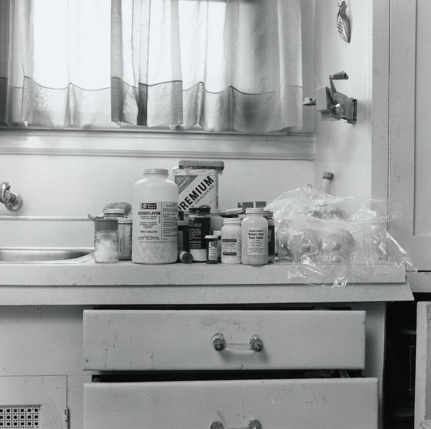 Countertop with Premium Crackers and Pills–and Can Opener