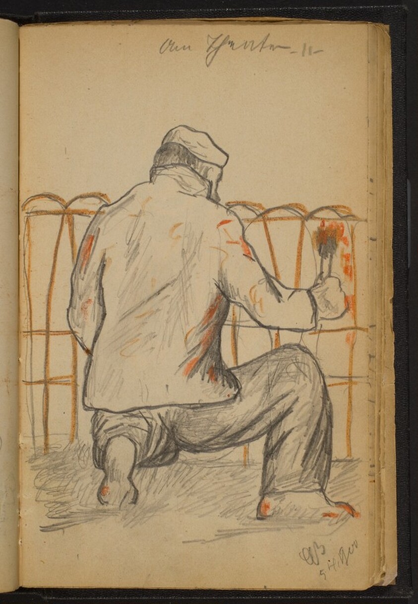 Man Painting a Fence seen from Behind