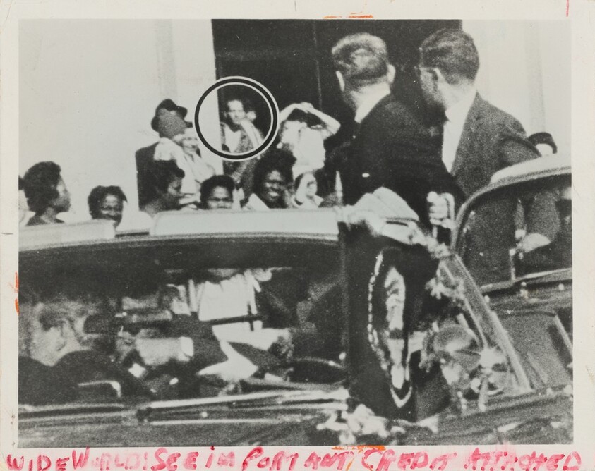 Title from caption on object: “Controversial Photograph Taken before the Doorway of Texas Book Depository at Time of the Assassination...”