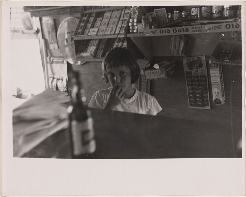 Girl behind store counter--Baton Rouge, Louisiana