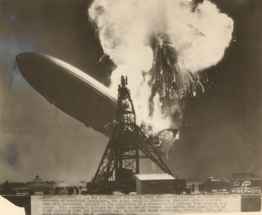 Title from caption on object: “Terrific Explosion Sends Hindenburg Crashing to Earth”
