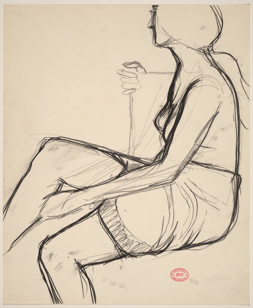 Untitled [seated woman in a skirt with a textured hemline]