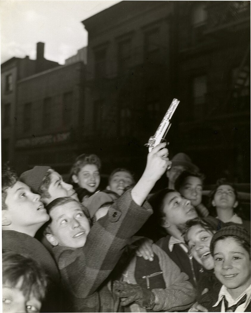 Boy Shooting "Zip" Gun in Air near Manhattan Police Headquarters, Mulberry and Mott Streets (Section Called "Little Italy"), New York City