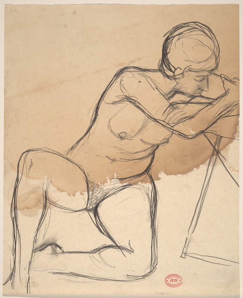Untitled [female nude seated on floor with arms on a chair seat]