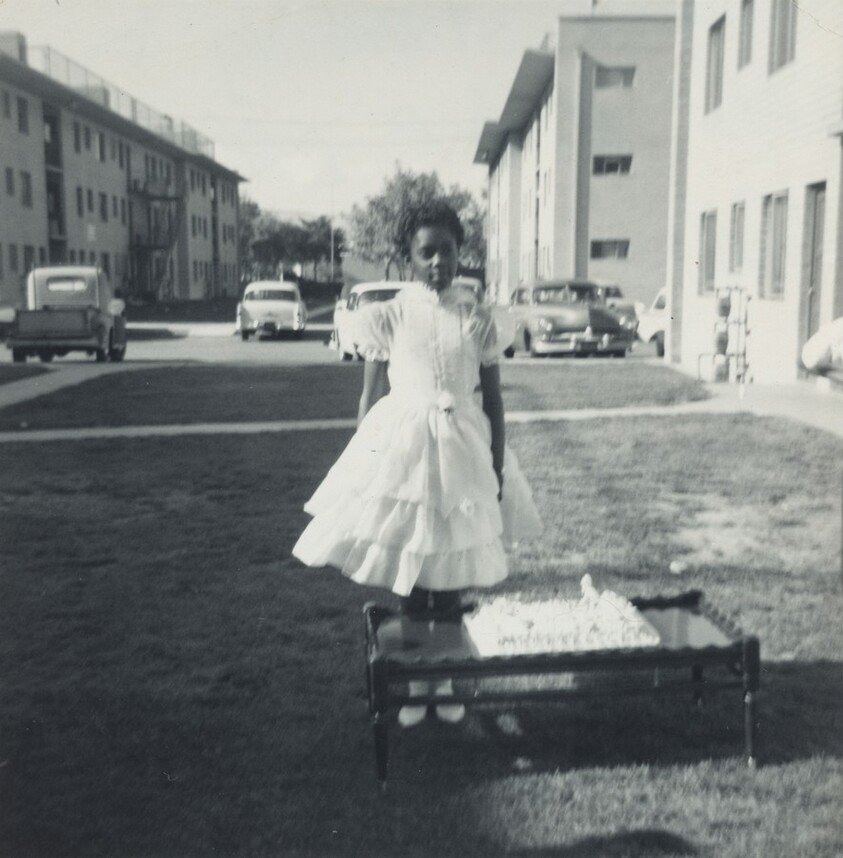 "Barbara Standing by Cake at Her Party. Taken April 1963"