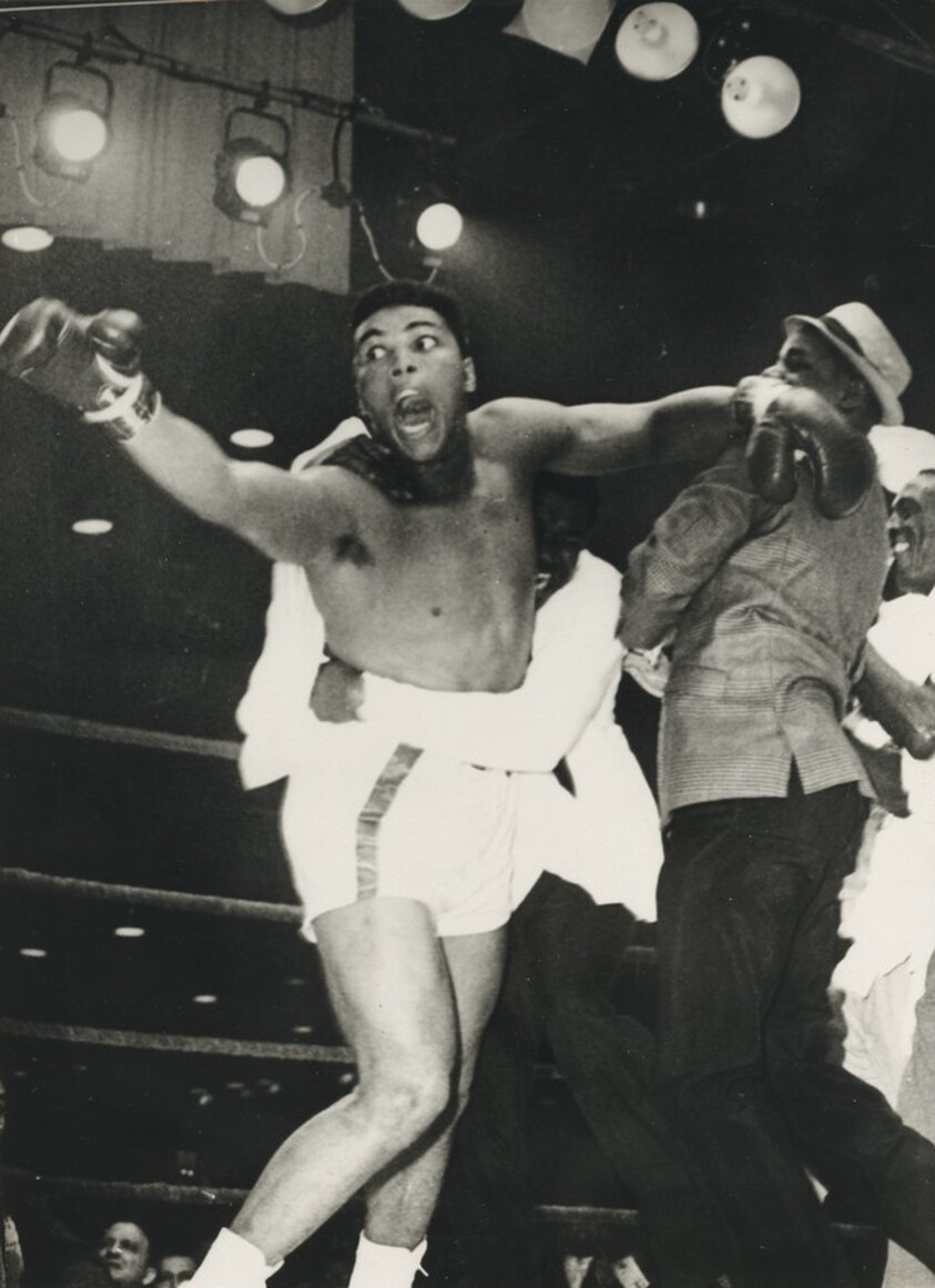 Title from caption on object: “Cassius Wins World Heavyweight Championship”