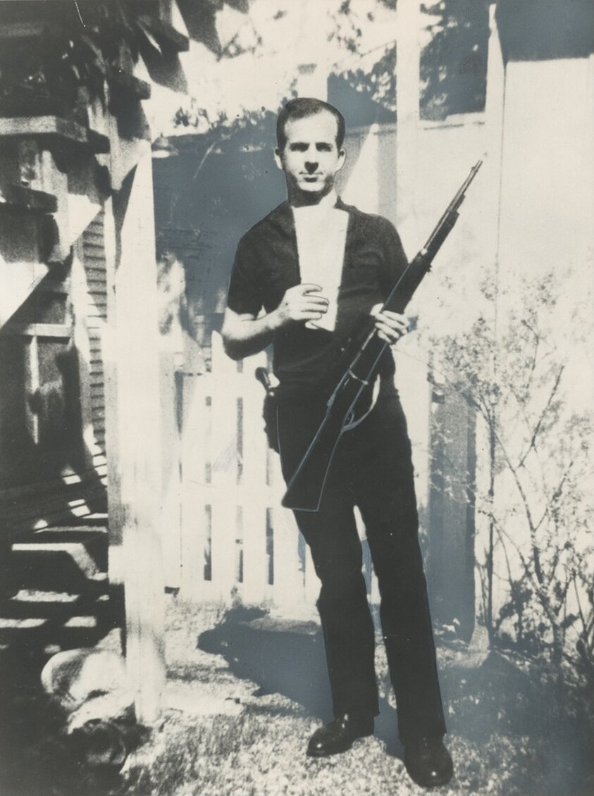 Title from caption on object: “Lee Harvey Oswald Holding the Rifle...”