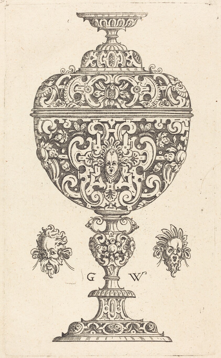 Goblet decorated with a masque with open mouth