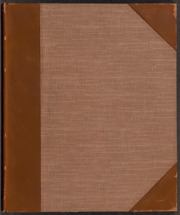 This is a photograph of a book cover. The cover features a textured fabric material in a neutral brownish tone, with reinforced corners and spine made of a smooth, slightly darker brown material resembling leather. The stitching pattern on the fabric gives it a subtle crosshatch design. The book cover does not contain any visible text, illustrations, or embellishments.