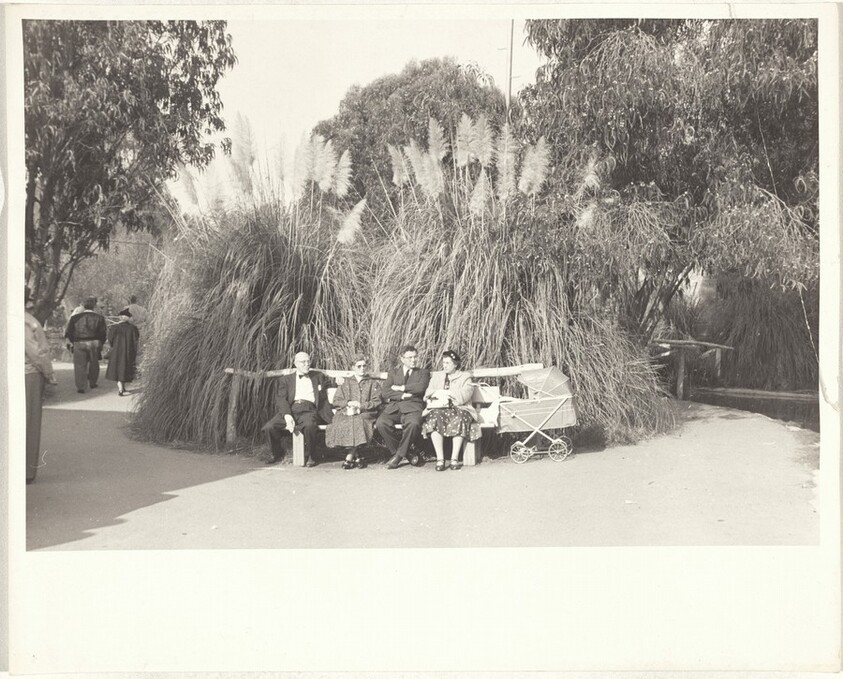 Group on park bench--Los Angeles