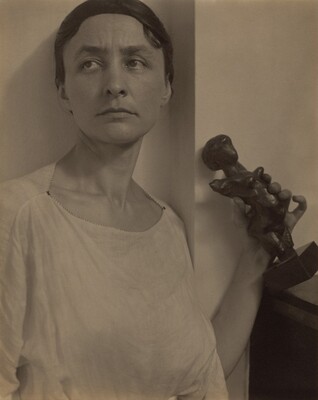Georgia O'Keeffe with Matisse Sculpture, Alfred Stieglitz, 1921