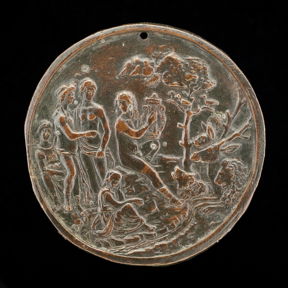 This is a photograph of a circular object with detailed engravings. A central scene contains figures in various poses, including a seated figure playing a lyre, surrounded by others in a gathering. The scene includes a tree and an animal resembling a stag. Above the figures, two smaller figures are amongst branches. The engraving shows flowing garments and textured landscapes.