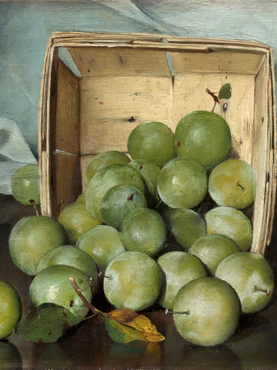 About two dozen round, pale green plums tumble out of an upended square wooden box onto a reflective, dark brown surface in this horizontal still life painting. Many of the plums have a frosty sheen and about half of them lie in a pile within the basket. The other dozen spill out of the box onto the wood tabletop. Most have stubby stems, and one, closest to us, has a longer stem with two browning leaves. The leaves and round fruit create reflections on the polished wood surface. The box was made by weaving broad sheets of light wood into a square. The layers are visible along the upper edge, which faces us. There are a few dark spots and imperfections in the wood. An ice-blue cloth hangs behind the box and crinkles in folds along the table. The artist signed the work in the lower right, “J.Decker.”