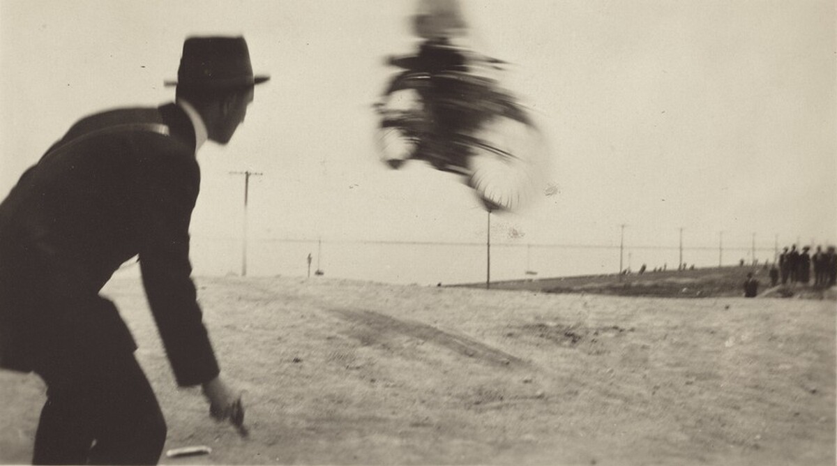 Untitled (Blurred bike in air)