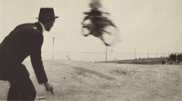 Untitled (Blurred bike in air)