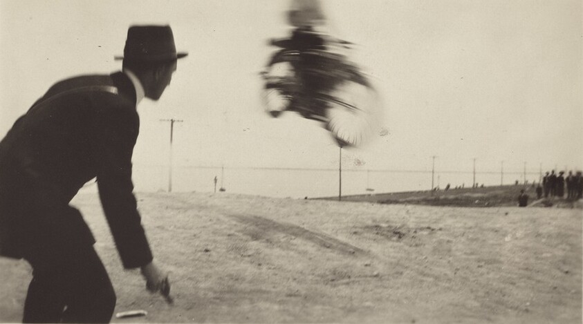 Untitled (Blurred bike in air)