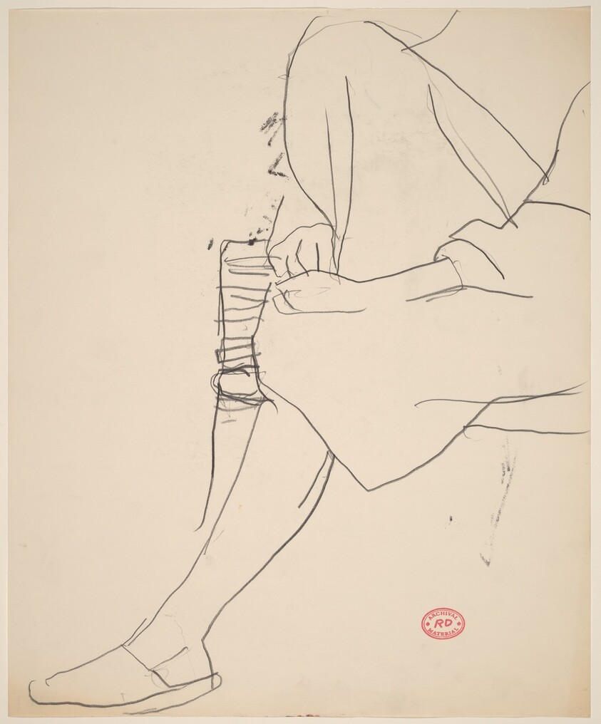 Untitled [seated woman with arms holding right leg]