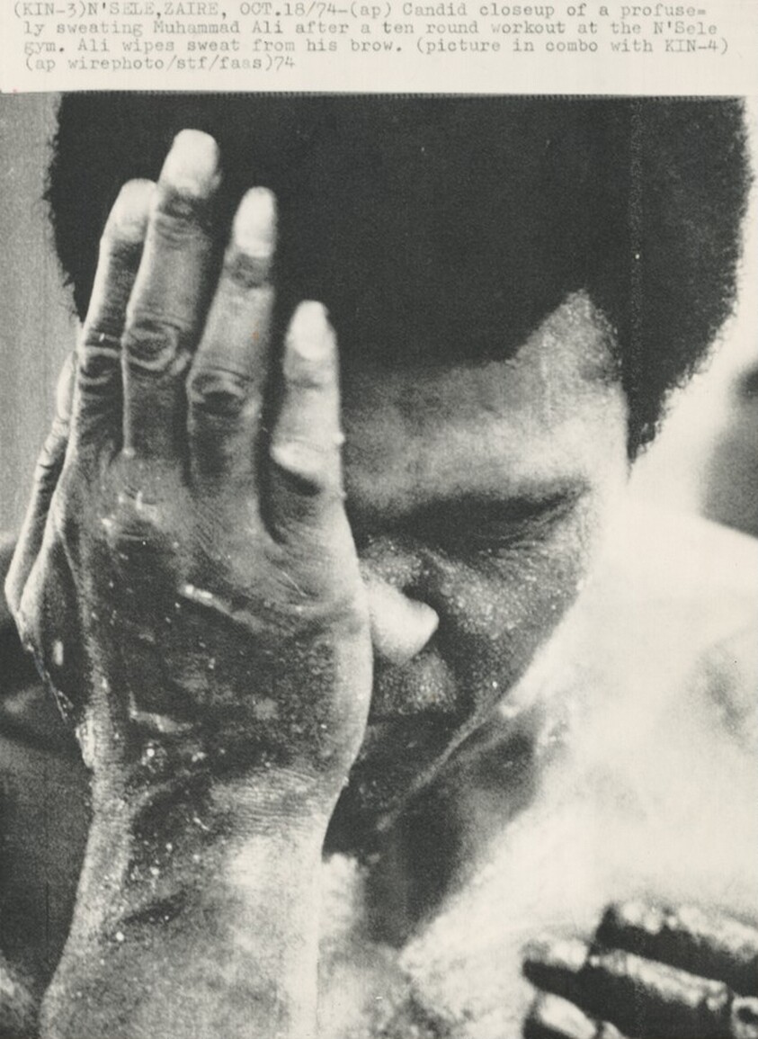 Title from caption on object: “Candid Closeup of a Profusely Sweating Muhammad Ali...”