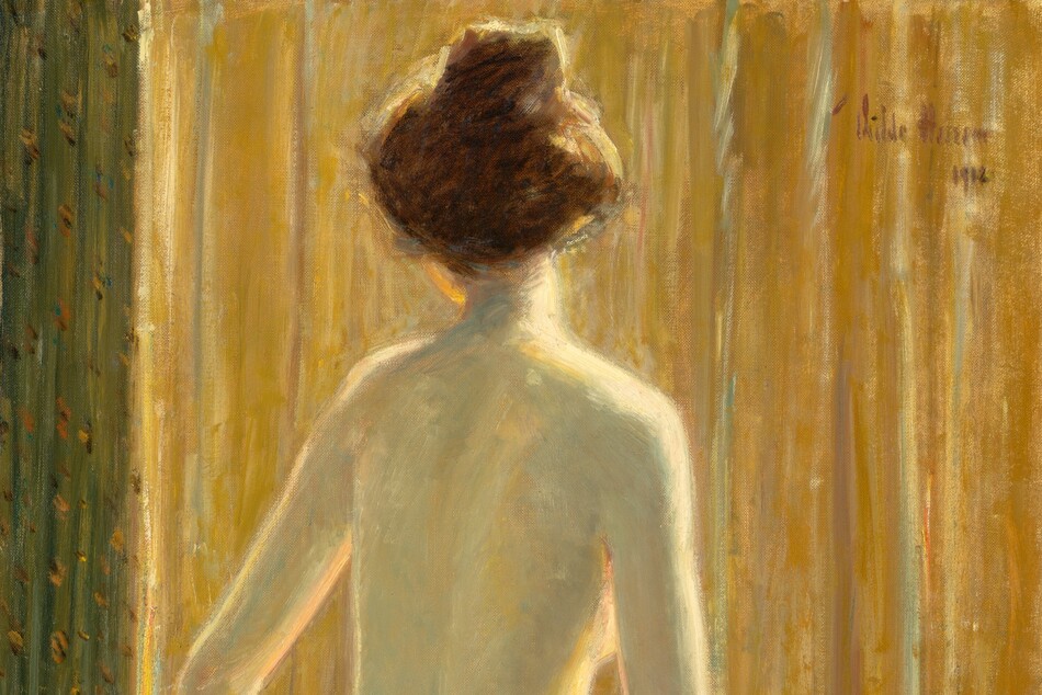 A nude, pale-skinned woman sits facing away from us on a surface with bunches of blue and green-toned fabrics in this vertical painting. The woman’s right knee and torso angle away from us to the right, but she turns her head a bit to our left so we see the underside of her chin. Her brown hair is pulled up loosely into a high bun. Her right hand rests on fabric bunched on that leg, and her other hand disappears on the far side of lemon-lime green and celestial-blue pile of cloth near the lower left corner of the painting. The background is mostly golden yellow, perhaps a curtain, with some vertical pleats in moss green along the left side. The woman is lit from our right so the edges of her right arm, breast, torso, leg, and neck glow. The scene is loosely painted but has an overall soft, blended look. The artist signed and dated the painting in the top right corner, “Childe Hassam 1912.”