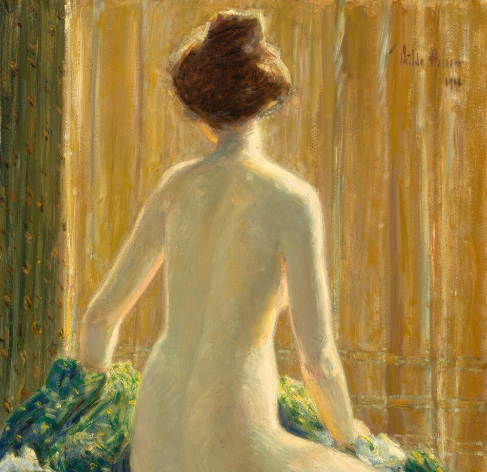 A nude, pale-skinned woman sits facing away from us on a surface with bunches of blue and green-toned fabrics in this vertical painting. The woman’s right knee and torso angle away from us to the right, but she turns her head a bit to our left so we see the underside of her chin. Her brown hair is pulled up loosely into a high bun. Her right hand rests on fabric bunched on that leg, and her other hand disappears on the far side of lemon-lime green and celestial-blue pile of cloth near the lower left corner of the painting. The background is mostly golden yellow, perhaps a curtain, with some vertical pleats in moss green along the left side. The woman is lit from our right so the edges of her right arm, breast, torso, leg, and neck glow. The scene is loosely painted but has an overall soft, blended look. The artist signed and dated the painting in the top right corner, “Childe Hassam 1912.”