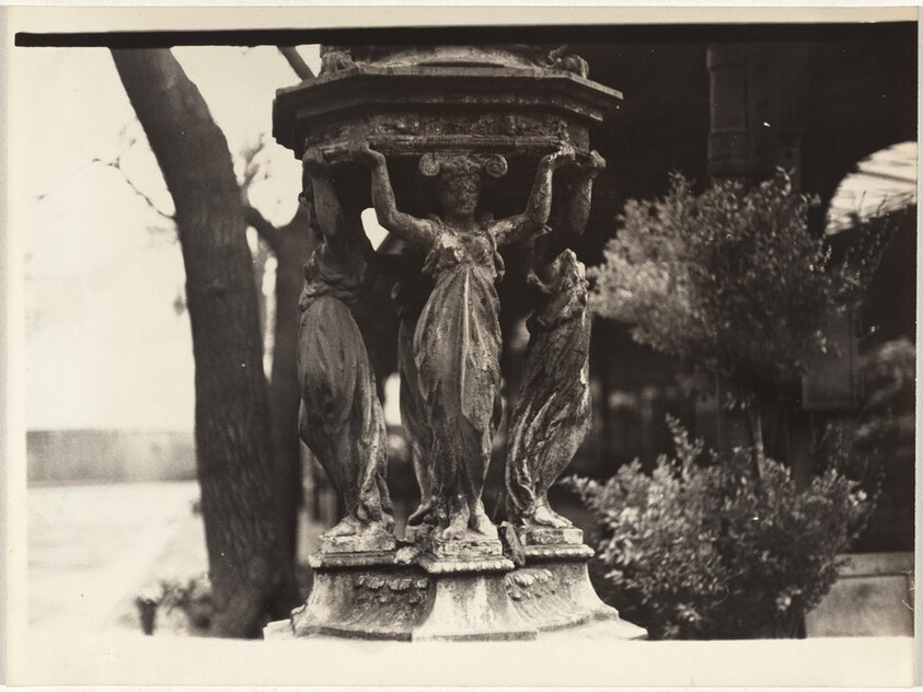 Sculpture detail and flowers, Paris
