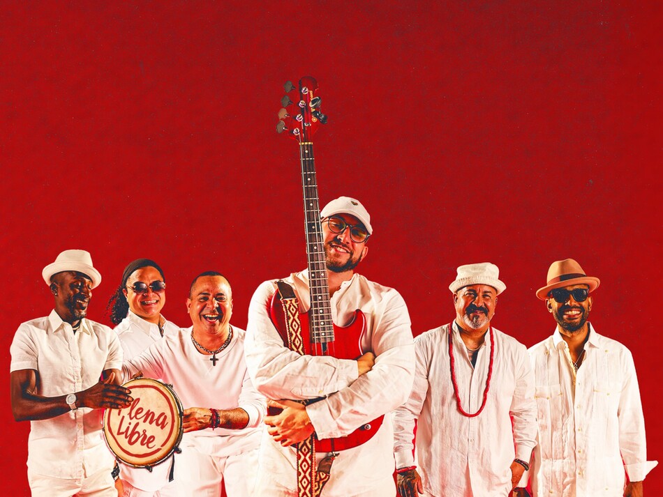 A band posing with their instruments.