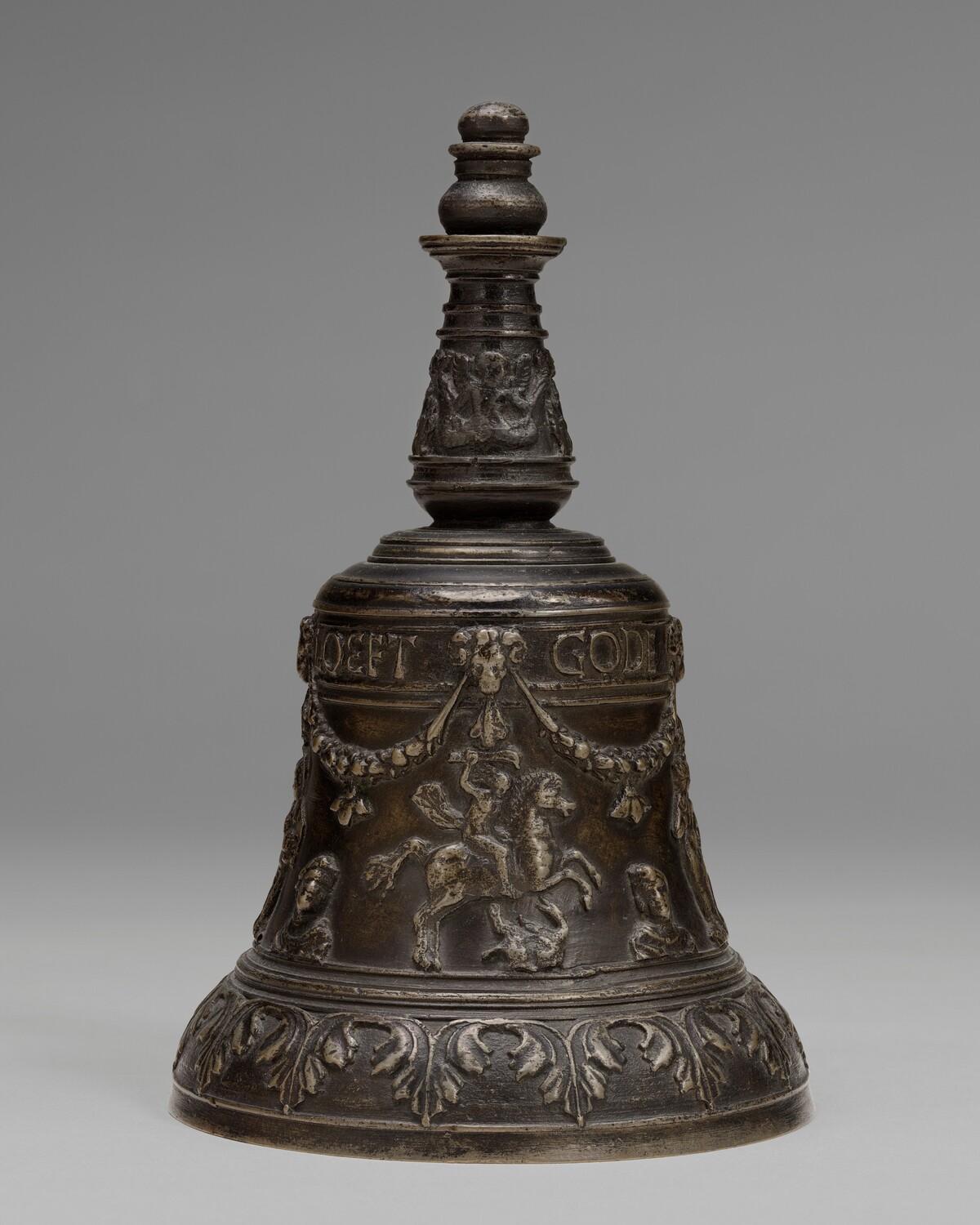 Hand Bell with Blessing Christ Child, Saint George Defeating the Dragon, Death of Laocoὄn, David and Judith, and Busts in Profile