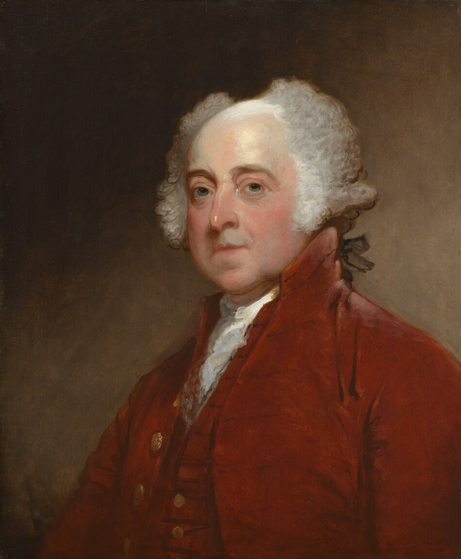 Shown from the chest up, a balding, light-skinned man wears a port-red vest and coat in this vertical portrait painting. The man’s shoulders are angled to our right, but he turns his head to look at us from the corners of gray eyes under heavy, brown brows. His under-eyes are shaded blue and lined with wrinkles. He has a bumped nose, bow-shaped lips, a round chin, fleshy, flushed cheeks, and sagging jowls. His white hair sweeps up and to either side of a bald patch, painted with a white sheen, on the top of his head. Curls come down over each ear and longer hair in the back is tied with a black ribbon. He wears a white ruffled cravat under the deep red vest and coat, both of which have gold-colored buttons down the front. The background lightens from earth brown in the upper left corner to paler, peanut brown in the lower right.