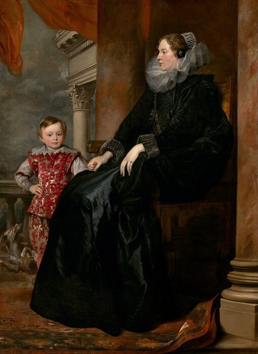 A woman wearing a voluminous black dress with a wide, ruffled collar sits holding the hand of a young boy, who stands next to her, in this vertical portrait painting. The woman sits with her body in profile facing our left, and she looks in that direction. The boy stands at her feet, behind her legs to our left, looking out at us. Both have pale, peachy skin with rosy cheeks, dark blond hair, and brown eyes. The woman’s hair is pulled back and covered with pearls, and a few short tendrils curl around her face. Her long black dress has puffed, black-on-black brocade sleeves, and the skirt is cut with short, decorative slits. The skirt has a sheen where the light falls, suggesting it is silk. Her wide, stiff, ruffled collar is pleated into a figure-eight pattern around her neck, and a thick gold chain loops over one shoulder to the opposite hip. The sleeves have wide, ruffled cuffs, and she wears a gold ring with a slate-blue gemstone on the pinky finger of her right hand, closer to us. The boy’s small fingers wrap around the woman’s right hand, farther from us. His body faces us, and his other hand rests on his hip. His straight hair falls across his forehead and to his ears. His suit has a crimson-red, leafy pattern against gray satin, and the sleeves are also nickel gray. A wide, lace-trimmed collar rests along his shoulders. A brown and white dog frolics behind the boy, looking up at him with mouth open and tongue hanging out. The woman’s chair is framed by two stone columns streaked with rust red and taupe, and they extend off the top edge of the composition. A balustrade runs behind the boy along an opening beyond. The top corner of an entablature or lintel supported by columns is visible against a steel-gray, cloudy sky. A red drape flutters above the pair, along the top edge of the canvas, and the red and brown woven carpet below kicks up at the base of the column closer to us.