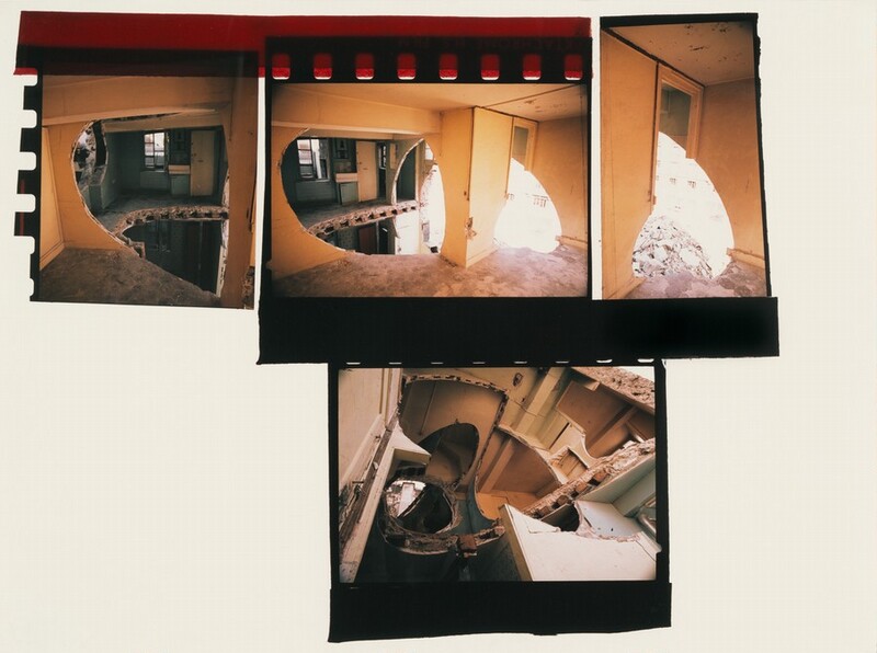 Frames from three film strips are against a white background in this horizontal composition. Together the three segments show four views of rooms in which oval-shaped holes gape in the walls and floors, as if a massive drill was chewing its way through the building. The rooms have light, tan-colored walls, and masonry and lumber are exposed where walls and floors have been partially removed. Three of the pictures, along the top of the composition, show views across rooms on a single floor. The bottom picture shows a view down through several stories of the building. Two fragments of the film strips appear to be affixed to the white background with red tap at the top left.