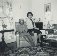 Untitled (Two women sitting in living room), American 20th Century, 1960s