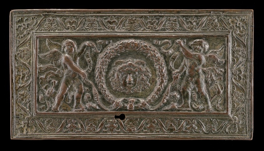 Cover of a writing casket: Geniuses with Wreath and Medusa Head
