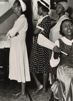 Washington, D.C. As in Moses' time, members of the St. Martins Spiritual Church remove their shoes during the annual "flower bowl demonstration" because during this service they walk on holy ground, Gordon Parks, 1942, printed later