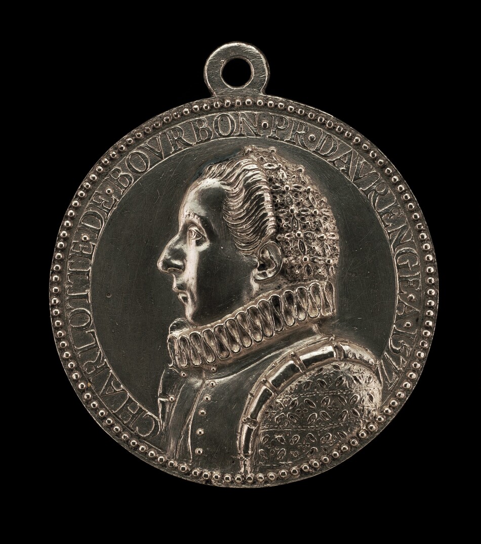 The sculpture is a profile portrait of a person with a prominent nose, a high collar, and detailed clothing, suggesting historical attire. It is a circular medal, predominantly silver in color, with intricate engravings and raised relief details. Surrounding the portrait, text is engraved in a circular pattern along the edge, which reads "CHARLOTTE DE BOVRBON P[R] D'AVRANGE." This medal is flat and thin with a small loop at the top.