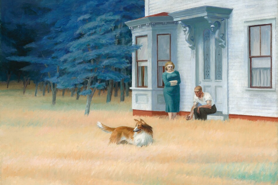 A light-skinned man and woman and a collie dog are outside a white house at the edge of a pale peach field of grass in this horizontal painting. Taking up a bit more than the top right quadrant of the composition, the house is white with pale blue shadows. Near the back, left corner of the house, the door has two tall, inset frosted glass panels and a shallow roof supported with scrolling, carved corbels. The door is flanked by a bay window on the left and a single window on the right. A shadowy grove of blue-green trees grows to the left of the house with one branch reaching toward the bay window. The woman faces us and stands between the bay window and door with downcast eyes and folded arms. Her blond hair is pulled or brushed back, and she wears a snug fitting, calf-length teal-blue dress. The man sits on the doorstep so his knees are angled to our left. His near arm drapes over his left knee and his far hand reaches toward the dog, his fingers and thumb touching. He has short blond hair and a ruddy face, and he wears a white t-shirt and olive-green pants. The dog stands in the middle of the field with its body angled to our right, its pointed ears and tail pricked up as it swivels its head to look to our left. It has an auburn-brown coat with white belly, chest, and tip of the tail. There are a few areas of spearmint green in the otherwise peach-colored grass, which is tall enough to brush the belly of the dog. The artist signed the lower right, “EDWARD HOPPER.”